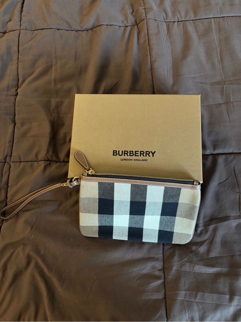 Burberry Check Wristlet in Beige, Black and Cream.